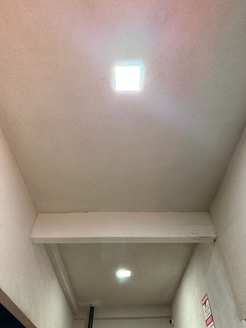 After: fully cleaned commercial soffit, no dust or cobwebs remaining